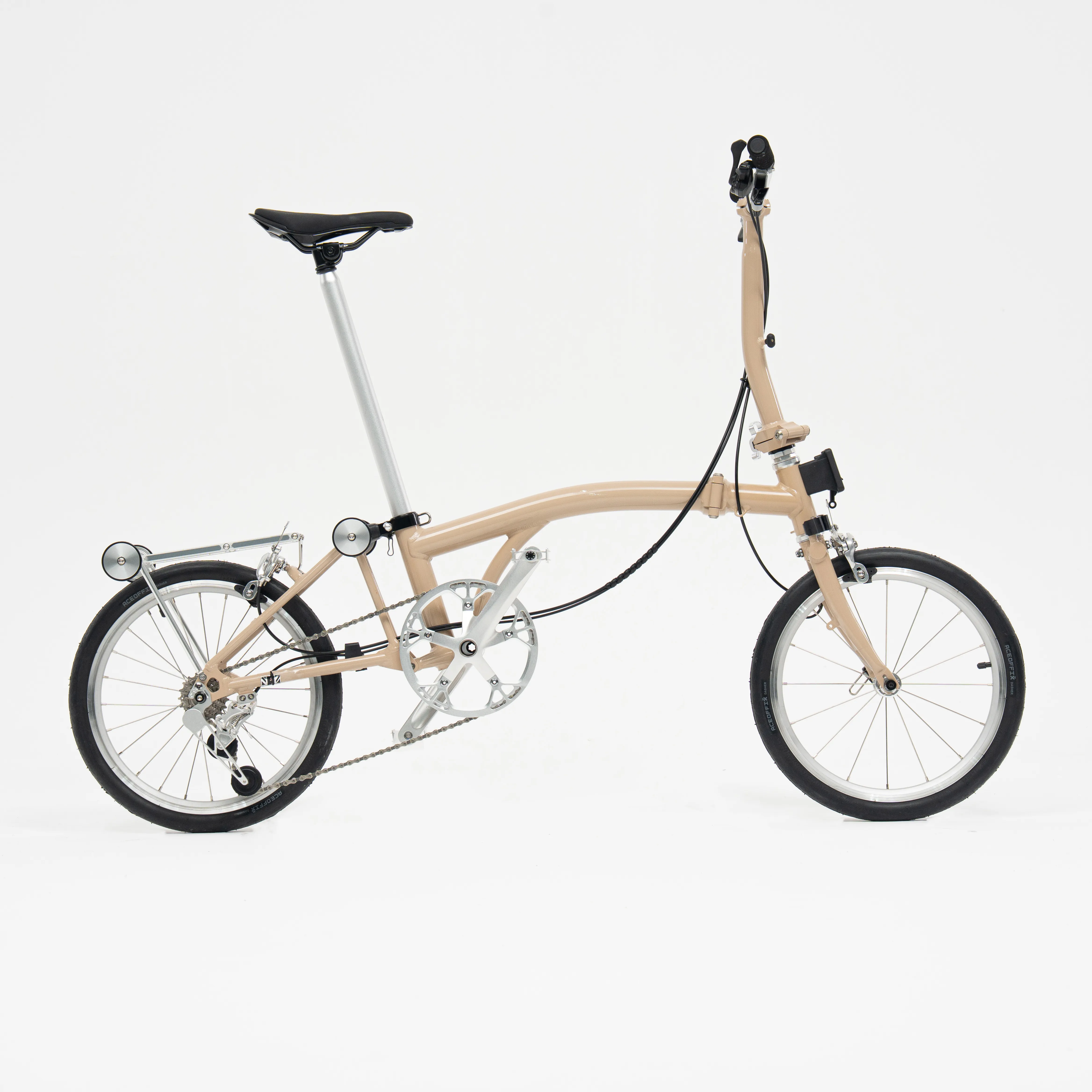 Lumio folding bike unfolded, Milk Tea colourway — full drive-side profile