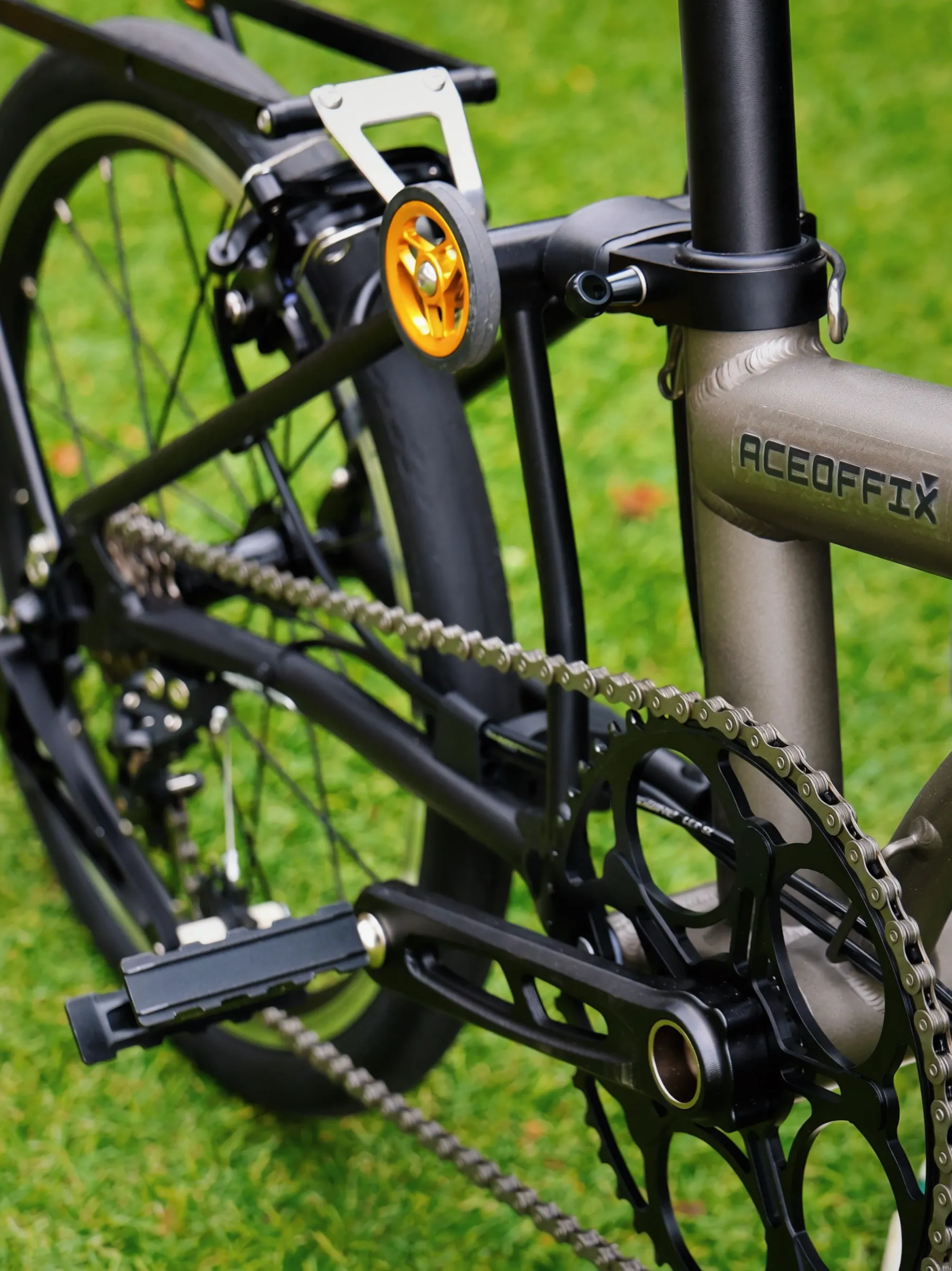 Aerra front carrier block and rack interface detail, photographed on the bike