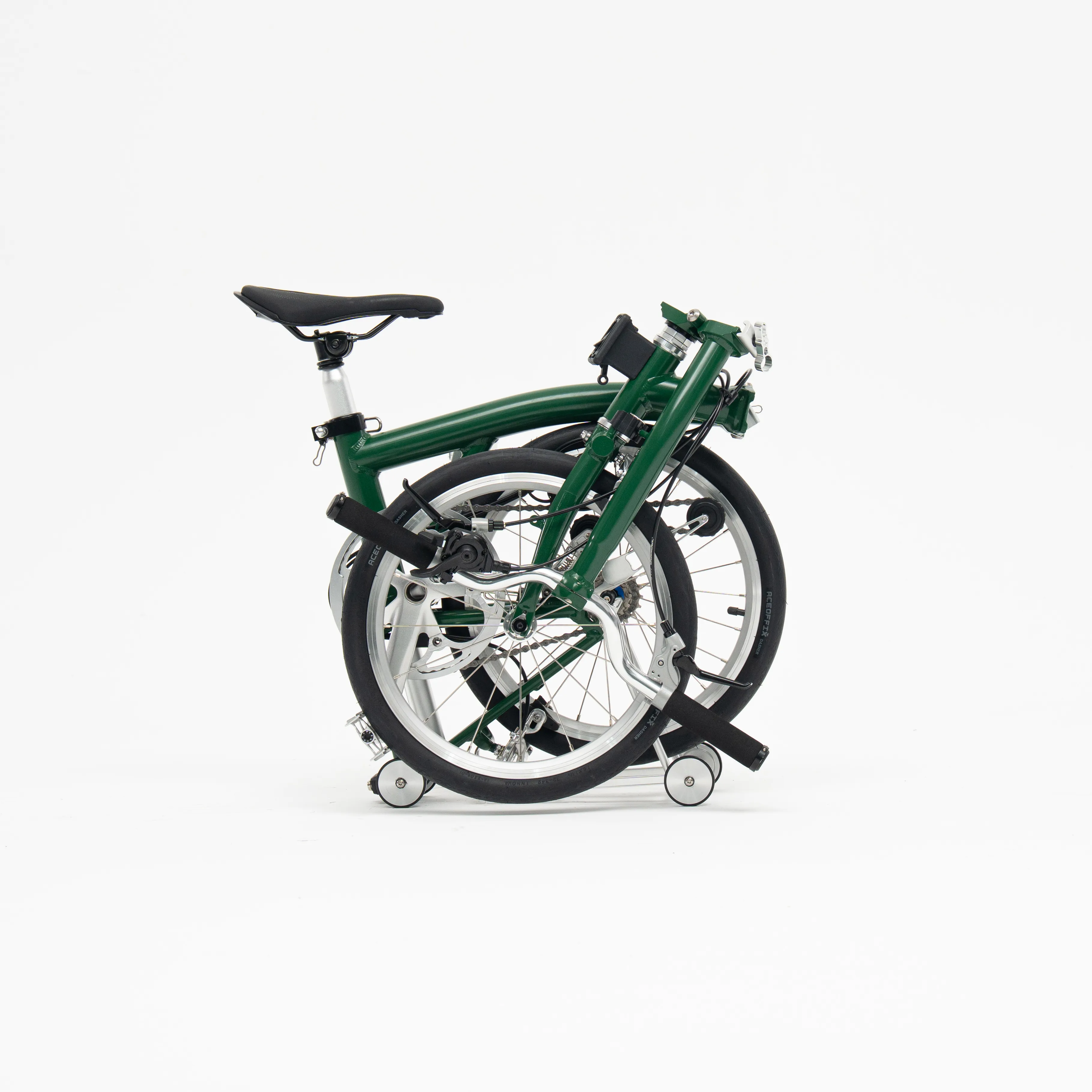 Lumio folding bike, Postal Green colourway, folded white-background studio shot