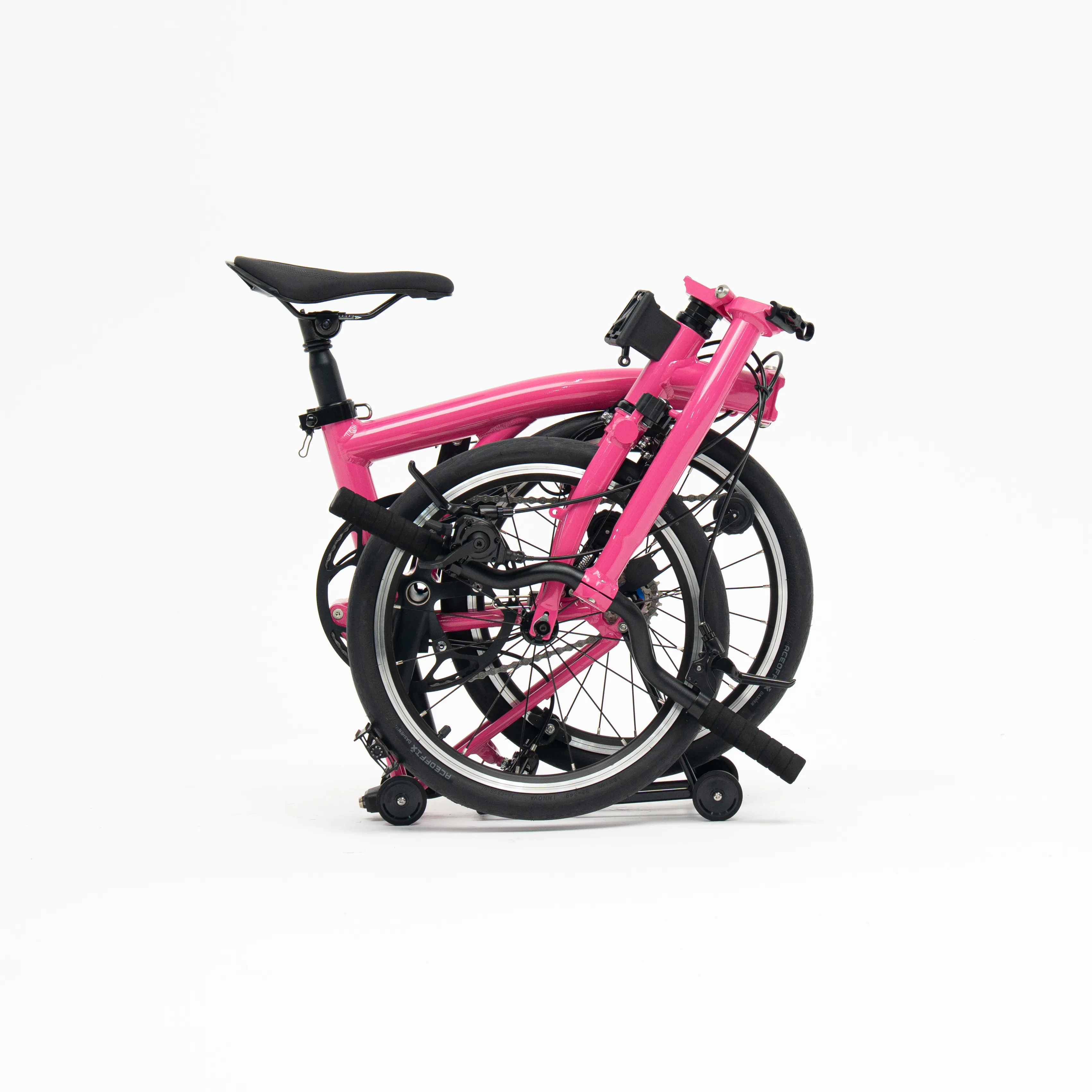 Lumio folding bike, Rose colourway, folded white-background studio shot