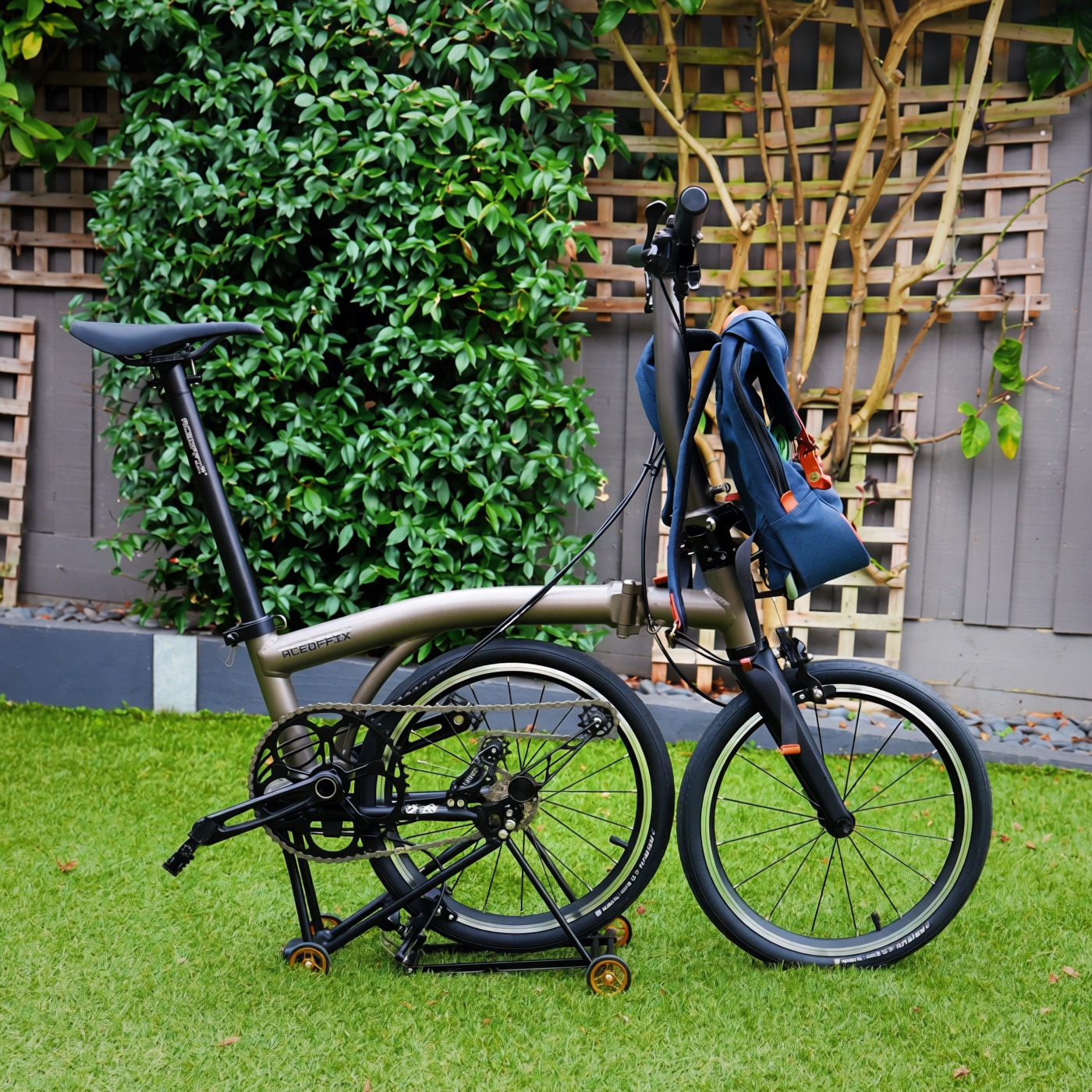An Aerra fitted with a front bag, showing everyday carry capacity in a studio-style close view.